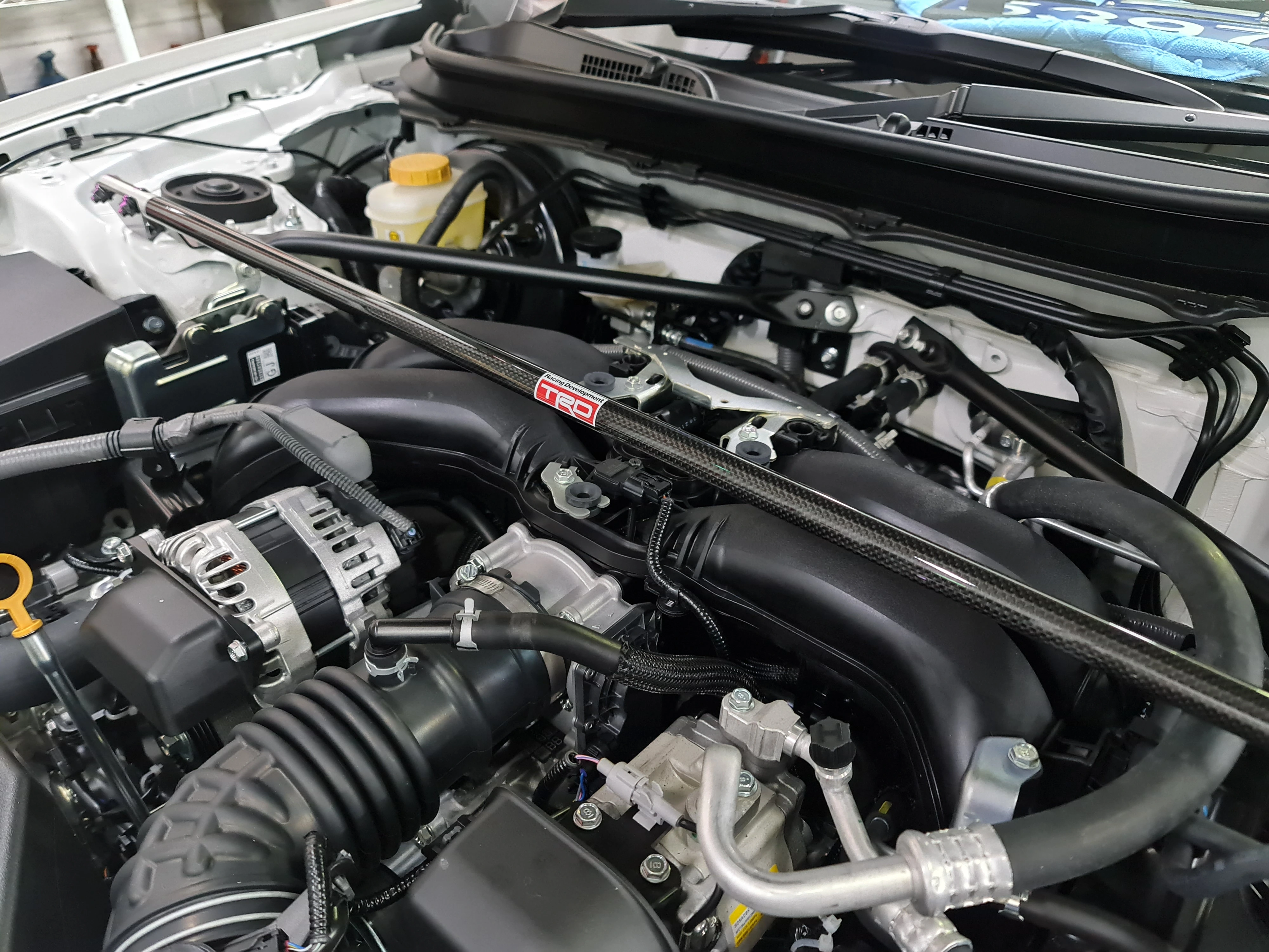 GR86 - TRD carbon front strut brace | Toyota GR Forum for owners