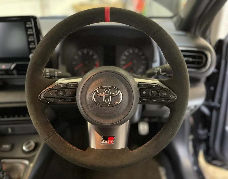 Yaris-GR-Full-Black-Alcantara-9040-Red-centre-stripe-Red-stitching.webp